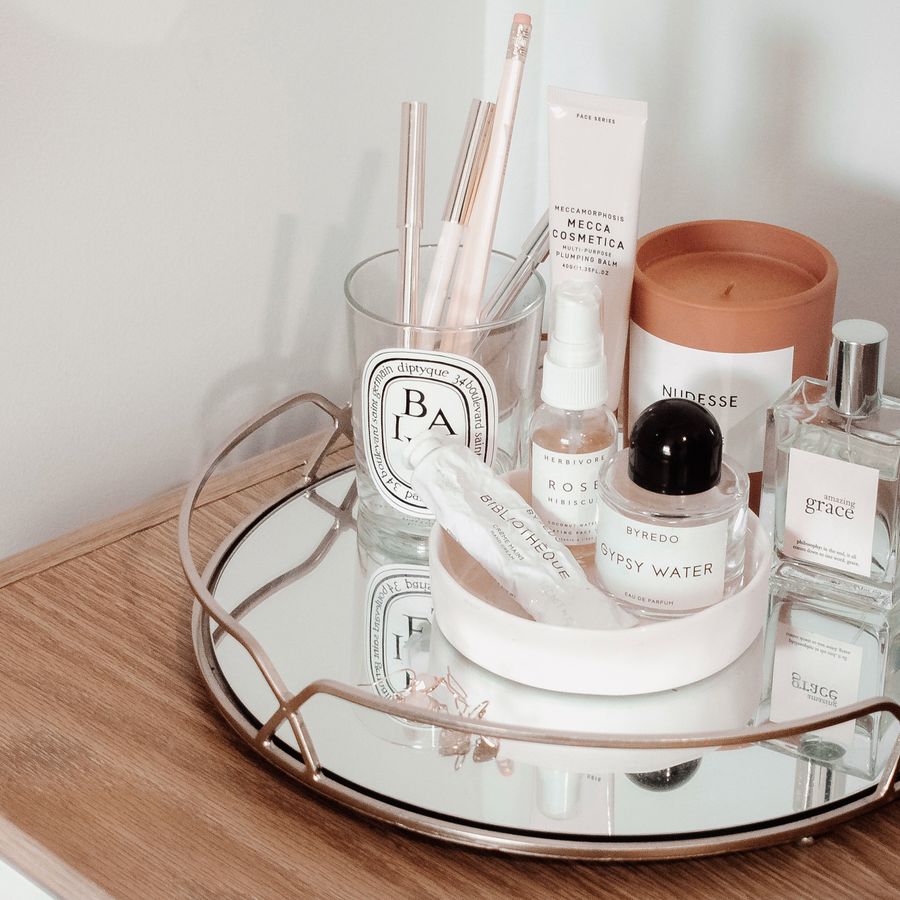 Makeup and skincare products on a tray